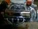 1994 Ford Bronco - Close-up of an engine chrome valve covers and headers.
