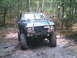 1988 Ford Bronco - This modified SUV is equipped for off-road adventures, with large tires and a protective roll cage.