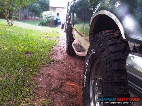 1993 Ford Bronco side view showing large Wrangler tires and running boards
