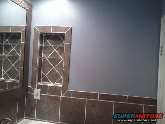 joshs-phone-108.jpg recessed, open med cabinet with 6" tile on a diagonal for backing with glass shelves