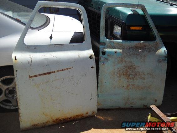 54-build--8172011-004.jpg 8-17-2011: I went on a little 150 mile road trip and picked up the last pair of doors I need. The one is a little rougher then I thought it was. But they should both be workable.  So now I have 6 doors. That should be enough for one truck.

Here's the pics of my newest crusty doors. The blue door looks worse then the white one but it's actually quite a bit nicer.
