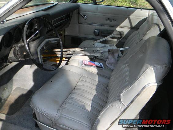 1979 Ford Ranchero interior with light-colored seats, dashboard, and steering wheel