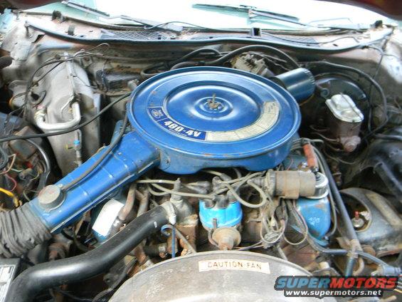 Engine bay of a 1979 Ford Ranchero with a blue air cleaner labeled 460-4V