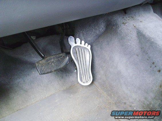 Interior foot pedals with a novelty foot-shaped gas pedal