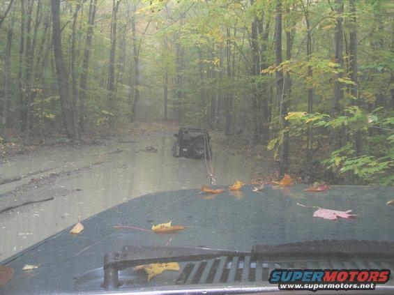 He tied on the roll bar and was doing wheelies while I was tugging on him .. wish I had the camera going then ;)