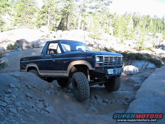 1986 Ford Bronco 3q-front view on rocky terrain