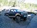 1986 Ford Bronco - This 1986 Ford Bronco navigates a challenging rocky trail, its off-road capabilities.