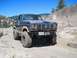 1986 Ford Bronco - This modified Ford Bronco navigates a challenging off-road environment.