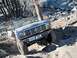 1986 Ford Bronco - This Ford Bronco navigates a challenging rocky trail, its grille and front end clearly visible.