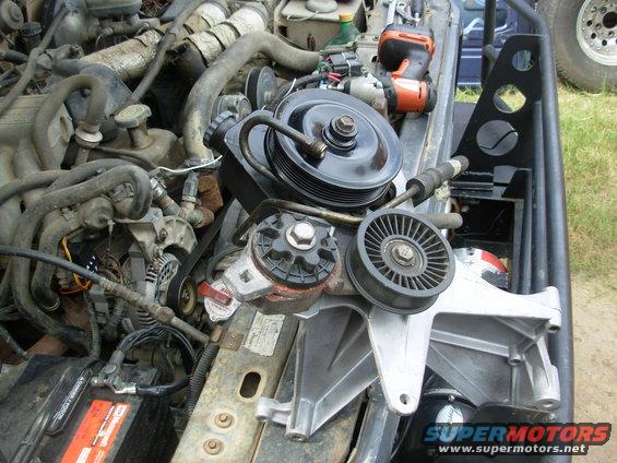 12sag.jpg I pulled this in a JY, took the pump off, sandblasted & clearcoated the bracket (EN: F5UE-19E708-BA), cleaned the pulley, and put it back together.  The bolt is just to keep trash out of the pump shaft threads.

[url=http://www.supermotors.net/registry/media/513526][img]http://www.supermotors.net/getfile/513526/thumbnail/pspumpsaginaw.jpg[/img][/url]