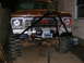 1978 Ford Bronco - This modified Ford truck features a prominent winch and a custom grille with red lettering.