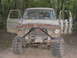 1978 Ford Bronco - This heavily modified 1978 Ford Bronco is ready for off-road adventures, with its doors wide open and covered in mud.