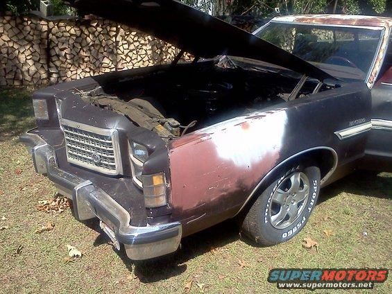 1979 Ford Ranchero front end with hood open, showing primer on fender