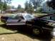 1979 Ford Ranchero - The vehicle has its hood and driver's door open, revealing the engine bay and interior.