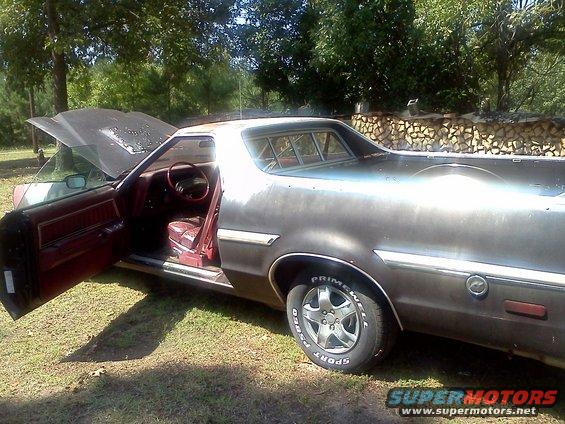 1979 Ford Ranchero with hood and driver door open, parked outdoors