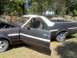 1979 Ford Ranchero - This 1979 Ford Ranchero is parked outdoors with its hood and driver's door open, revealing the interior and engine bay.