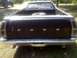 1979 Ford Ranchero - Rear view of a 1979 Ford Ranchero pickup. A spare tire is stored in the bed.