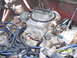 1978 Ford Bronco - Engine bay detail showing a carburetor and associated plumbing and wiring. Date stamp visible.