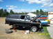 1978 Ford Bronco - This 1978 Ford Bronco is undergoing maintenance, lifted on jack stands with its hood open.