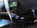 2003 Ford Taurus - Engine bay components including hoses and a green connector are visible in this close-up shot.