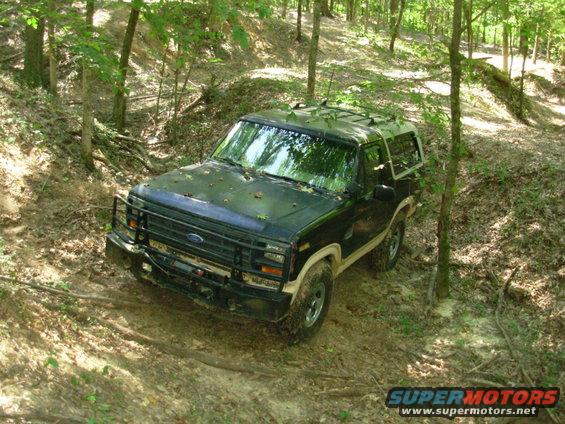 110828stuck9.jpg Last Saturday evening, we decided to make a quick run before it rained.  But just as I got down in this hole, it started to sprinkle, and I got a little too anxious to get out, and blew the LHF hub lock.  Rather than make a mess, I just left it until today.