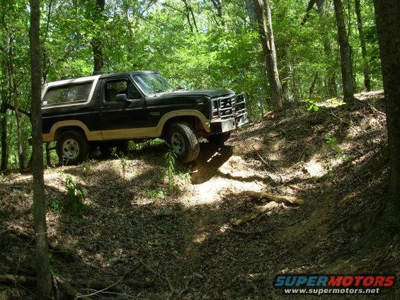 110828unstuck2.jpg It came out a lot more easily than I expected - I didn't even need the winch to get here.  But there had always been a stump that made this little hilltop tricky, so I pulled it out today.