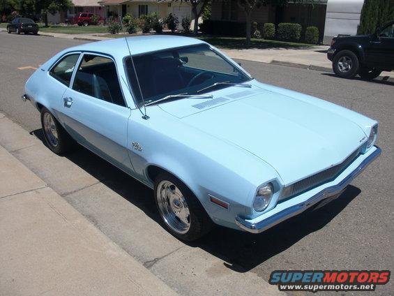 Light blue 1972 Ford Pinto coupe parked curbside
