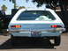 1972 Ford Pinto - Rear view of a 1972 Ford Pinto hatchback, showing its distinctive taillights and chrome bumper.