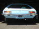 1972 Ford Pinto - The rear of a light blue 1972 Ford Pinto hatchback is shown parked in a garage.