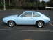 1972 Ford Pinto - A light blue 1972 Ford Pinto coupe is parked in a lot, with 'GROOM' written on the window.