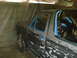 1972 Ford Pinto - A pickup truck is being prepped for paint inside a makeshift spray booth.