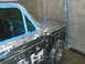 1972 Ford Pinto - Vehicle undergoing bodywork preparation, covered in primer and masking tape.