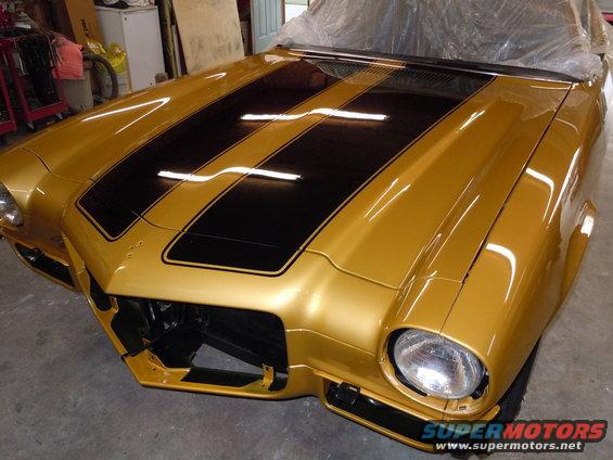 Gold 1970 Chevrolet Camaro front with black racing stripes