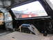 1987 Dodge 1500 - The interior of a pickup truck is shown, revealing the bare metal of the cab and the rear wheel wells.