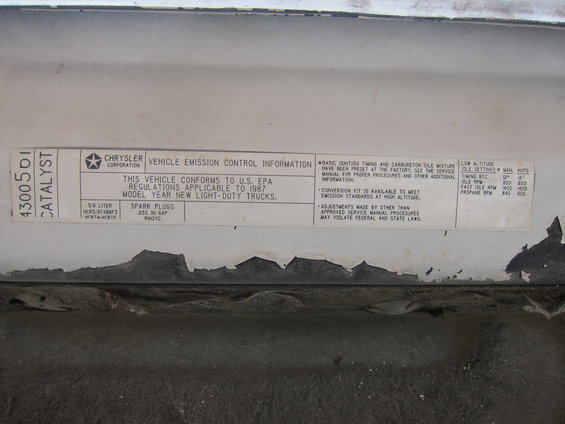 Sticker on a 1987 Dodge 1500 showing emission control info