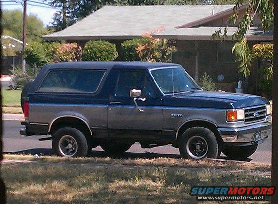 1990 Ford Bronco parked on a residential street