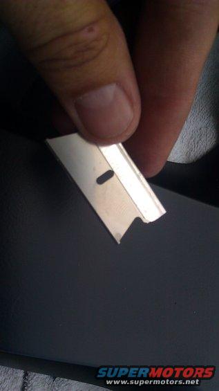 imag0497.jpg I first tried an Xacto knife, but It wanted to skip, or grip, as I cut.  This blade did the job, notice the end has a different edge than the normal razor blade, thats the key to a smooth cut.