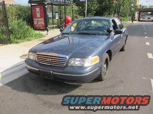 1998 Ford Crown Victoria, blue sedan, 3q-front view