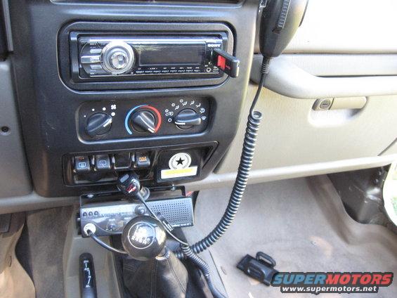 2005 Jeep Wrangler interior showing dashboard with Sony radio, CB radio, and gear shift
