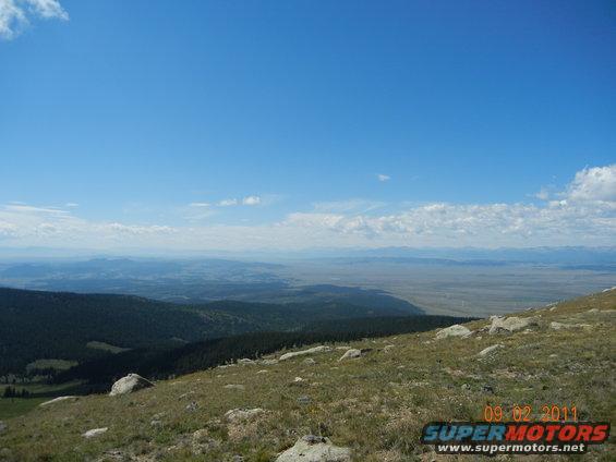 Mountain landscape with a wide view of plains and sky, dated 09/02/2011