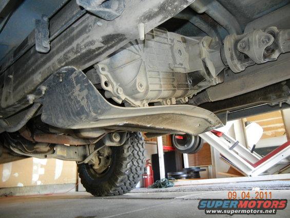 Undercarriage view of vehicle transmission and driveshaft