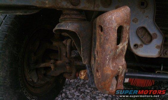 Passenger side frame where bumper mounts needs straightened out.