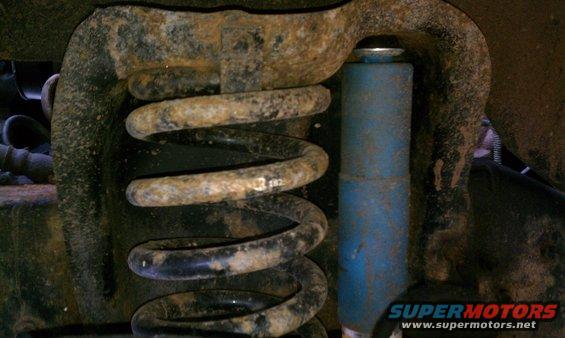 Original shock tower with 2" coil and shock.  Installing dual shock tower and 4" coil and shock.