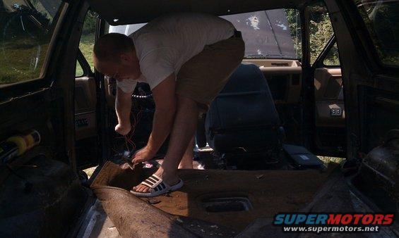 My Bro clearing out the old carpeting.