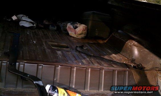 Passenger side view of cleared out cargo area.