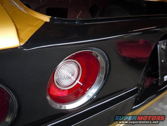 1970 Chevrolet Camaro rear tail light assembly, black and gold paint