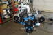 1997 Ford Ranger - Engine assembly on a stand, a blue block and silver intake manifold, with various pulleys and belts visible.