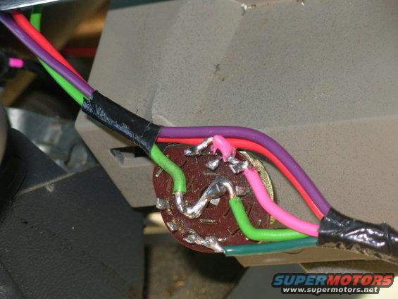 idle3.jpg The LtGreen ground wire is soldered to both poles (center).  The Pk wire is soldered to the 2nd & 4th throws; the DG to the 3rd & 4th.  So throw 1 grounds nothing; 2 grounds Pk; 3 grounds DG; 4 grounds both.

It's POSSIBLE that this switch is equivalent, but I haven't confirmed that:
[url=http://www.amazon.com/dp/B001PNMC2K/][img]http://ecx.images-amazon.com/images/I/4183D2ajoGL._AA160_.jpg[/img][/url] {-Clickit