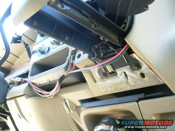 idle4.jpg The Pk & DG wires are routed with some others that I'm installing at the same time, then under the cupholder, into the dash, and behind the glovebox to the PCM.