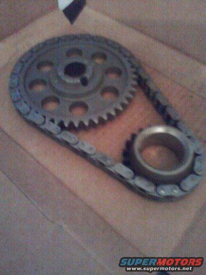 Timing chain and gears laid out on a surface